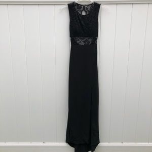 Black maxi length dress with lace and front slit